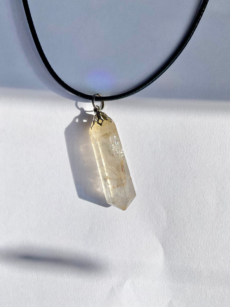 Clear Quartz Point with Inclusions
