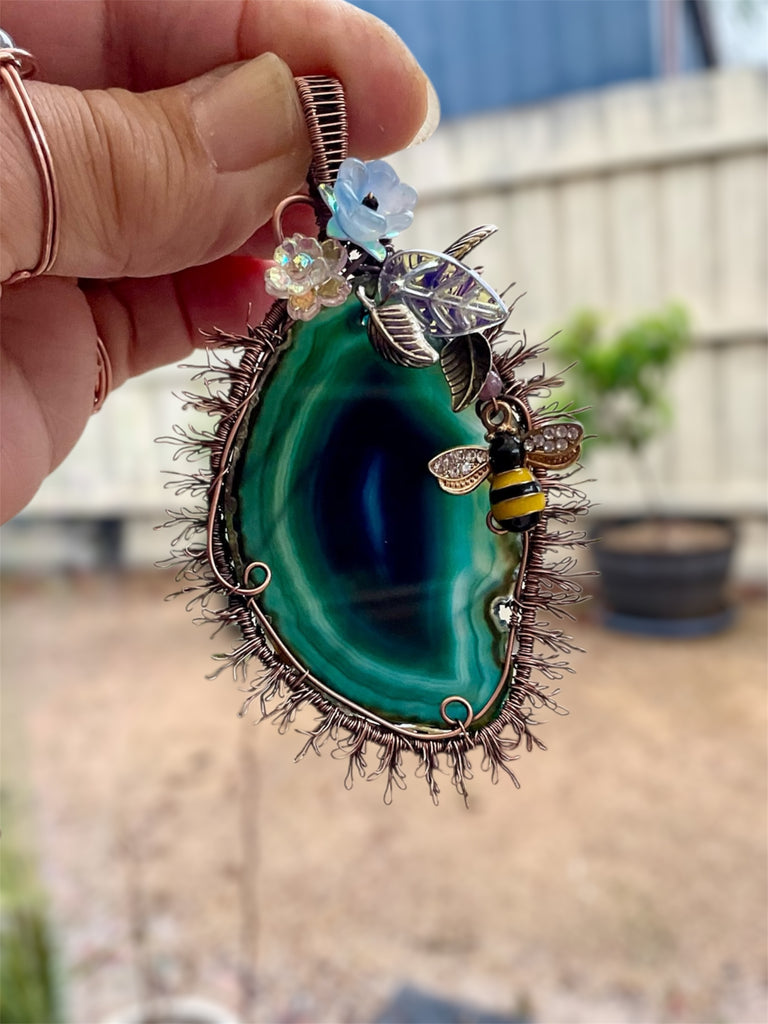 Teal Coloured Agate Slice Sun Pendant with Bee and Floral Accents